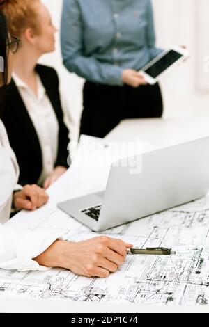 Mid section of businesswomen at meeting Stock Photo