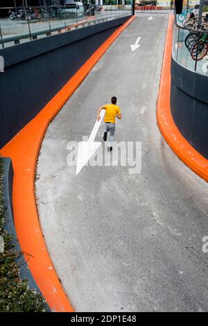 Young man jogging outdoor Stock Photo