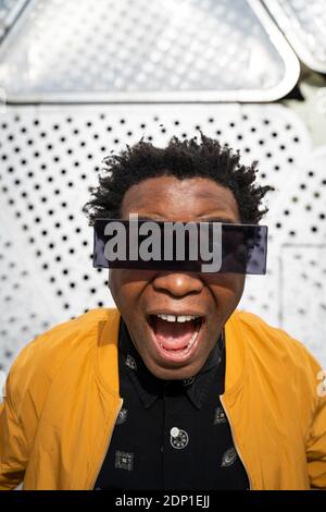 Portrait of performing mature man wearing modern sunglasses, Barcelona, Spain Stock Photo