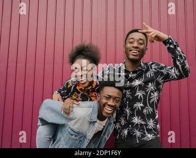 Group picture of three friends having fun together Stock Photo