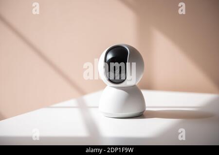 white video surveillance camera to monitor babies, children or areas of the house Stock Photo