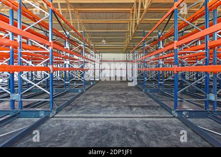 Empty New Shelves Racks in Distribution Warehouse Stock Photo