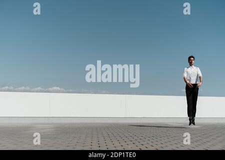 Ballet dancer practising on roof terrace Stock Photo