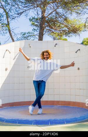 Portrait of bearded young man having fun outdoors Stock Photo