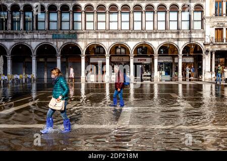 Acqua Alta (High Tide) St Mark’s Square, Venice, Italy. Stock Photo