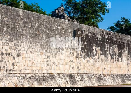 The stone goal ring in the Great Ballcourt of Chichen Itza, a large pre-Columbian Mayan city and archaeological site in Yucatan State, Mexico Stock Photo
