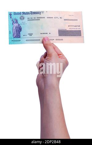 Womans Hand Holding Up a Tax Refund Check. Stock Photo