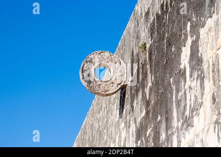 The stone goal ring in the Great Ballcourt of Chichen Itza, a large pre-Columbian Mayan city and archaeological site in Yucatan State, Mexico Stock Photo