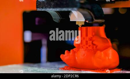 Three dimensional printing machine prints physical 3D model Stock Photo