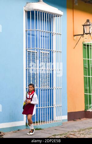Schoolgirl walking, Trinidad, Cuba Stock Photo