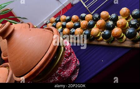 Tajine, traditional clay pot using to prepare vegetables with meat (tajine). Morocco. Stock Photo