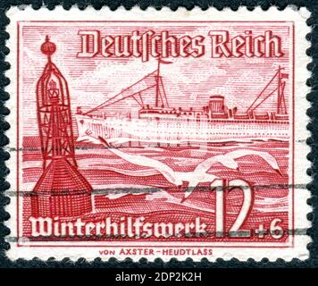 GERMANY - CIRCA 1937: Postage stamp printed in Germany, issue Winter relief, shown a steamer 'Tannenberg' of East Prussia naval service, circa 1937 Stock Photo