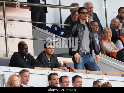 PSG players Jean-Christophe Bahebeck, Thiago Silva and Zlatan Ibrahimovic support their team playing against Lille during French First League soccer match, at Parc des Princes stadium in Paris, France on April 25, 2015. Photo by Christian Liewig/ABACAPRESS.COM Stock Photo