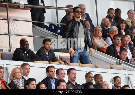 PSG players Jean-Christophe Bahebeck, Thiago Silva and Zlatan Ibrahimovic support their team playing against Lille during French First League soccer match, at Parc des Princes stadium in Paris, France on April 25, 2015. Photo by Christian Liewig/ABACAPRESS.COM Stock Photo