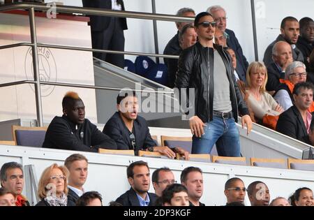 PSG players Jean-Christophe Bahebeck, Thiago Silva and Zlatan Ibrahimovic support their team playing against Lille during French First League soccer match, at Parc des Princes stadium in Paris, France on April 25, 2015. Photo by Christian Liewig/ABACAPRESS.COM Stock Photo