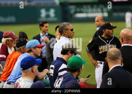 US President Barack Obama watches the 2015 Congressional Baseball Game surrounded by the Democrat Baseball team and the Secret Services Agents at the Nationals Park Stadium, in Washington, DC, USA, on June 11, 2015. Photo by Aude Guerrucci/Pool/ABACAPRESS.COM Stock Photo