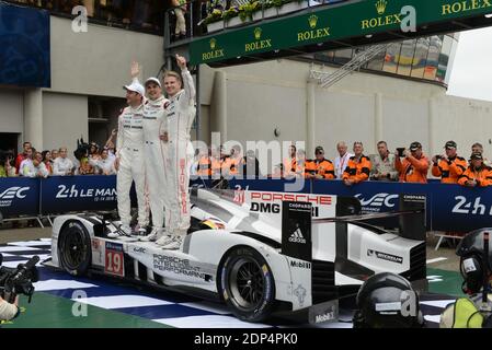 Race winners Nico Hulkenberg (GER) / Earl Bamber (NZL) / Nick Tandy (GBR) during Le Mans 24-Hour race at the Circuit de la Sarthe on June 14, 2015 in Le Mans, France. Photo by Guy Durand/ABACAPRESS.COM Stock Photo