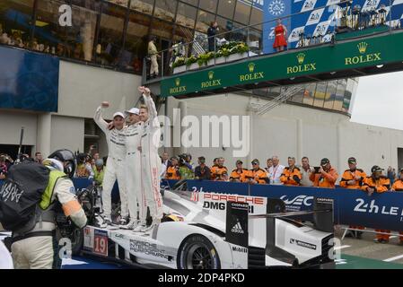 Race winners Nico Hulkenberg (GER) / Earl Bamber (NZL) / Nick Tandy (GBR) during Le Mans 24-Hour race at the Circuit de la Sarthe on June 14, 2015 in Le Mans, France. Photo by Guy Durand/ABACAPRESS.COM Stock Photo