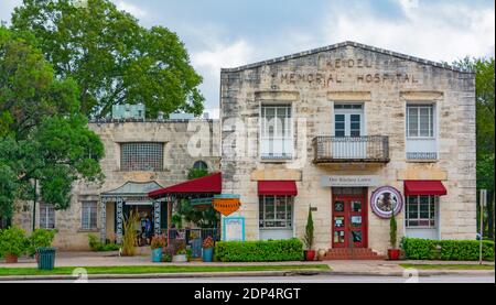 Texas, Gillespie County, Fredericksburg, historic Keidel Memorial Hospital, now contains store and restaurant Stock Photo