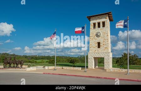 Texas, Gillespie County, Fredericksburg, Texas Rangers Heritage Center, Campanile Bell Tower, bronze sculpture of Rangers in period dress through the Stock Photo