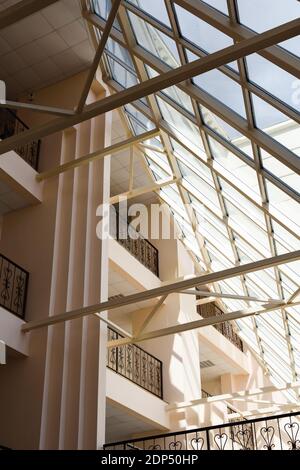 New modern construction with big sloping window. Architecture concept vertical Stock Photo
