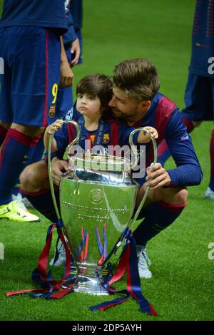 Barcelona's Gerard Pique poses with the trophy after the Champion's League Final soccer match, Barcelona vs Juventus in Berlin, Germany, on June 6th, 2015. Barcelona won 3-1. Photo by Henri Szwarc/ABACAPRESS.COM Stock Photo