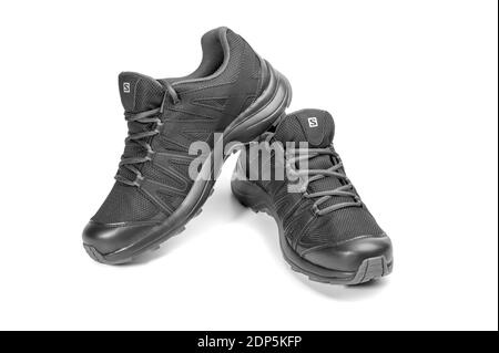 Moscow, Russia December - 19, 2018: Salomon XA TICAO GTX black sneakers on white background. Close-Up Of Shoes Over White Background. Contagrip outsol Stock Photo
