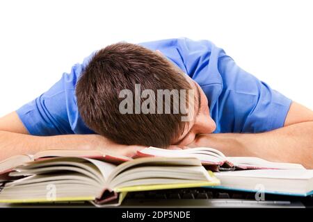 Tired Student sleep on the Book on the White Background Stock Photo