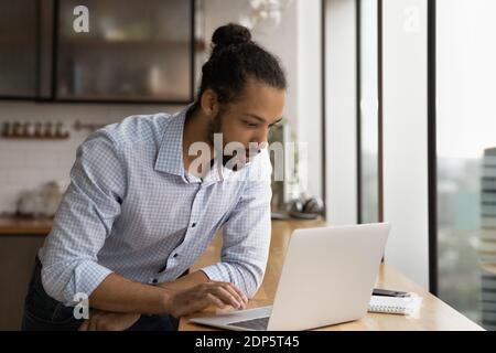African American man work on laptop in office Stock Photo