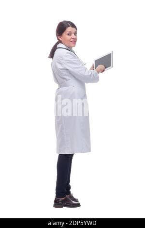 Smiling female doctor or nurse with tablet pc computer showing thumbs up Stock Photo