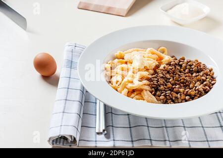 homemade 'spaetzle' noodles and lentils Stock Photo