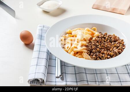 homemade 'spaetzle' noodles and lentils Stock Photo
