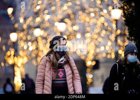 Warsaw, Poland. 18th Dec, 2020. A woman wearing a face mask is seen in Warsaw, Poland, Dec. 18, 2020. Poland confirmed on Friday 11,013 new COVID-19 cases, bringing the country's total caseload to 1,182,864, according to the country's health ministry. The ministry also reported 426 new deaths from the virus, raising the national death toll to 24,771. The Polish government announced on Thursday a nationwide lockdown from Dec. 28 to Jan. 17 in an effort to contain the COVID-19 epidemic. Credit: Jaap Arriens/Xinhua/Alamy Live News Stock Photo