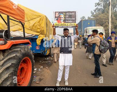 anti government slogans written by youth at protest site delhi border. Stock Photo