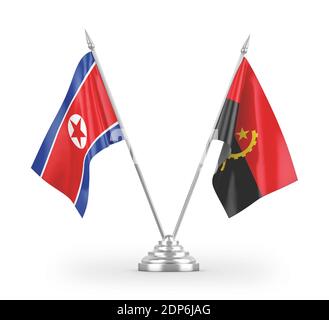 Angola and North Korea table flags isolated on white 3D rendering Stock Photo