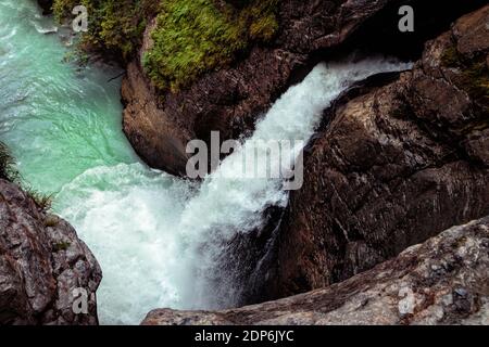 The lower waterfall of the Trümmelbach glacier waterfalls in the Lauterbrunnen Valley, Bernese Oberland, Switzerland Stock Photo