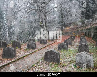 Graves and tombstones in the cemetery located near Church on the Hill in Sighisoara. Stock Photo