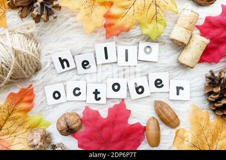 hello October greeting card , autumn background with dry fall leaves Stock Photo