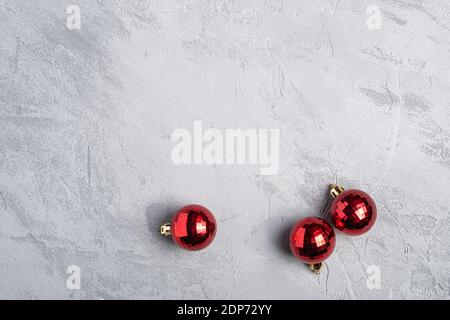 Christmas holidays composition. Red ornament and bauble decorations. Copy space Stock Photo