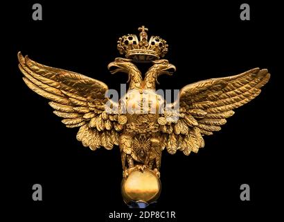 Russian Double Headed Eagle the coat of arms of Russian Empire Emblem isolated in black background Stock Photo