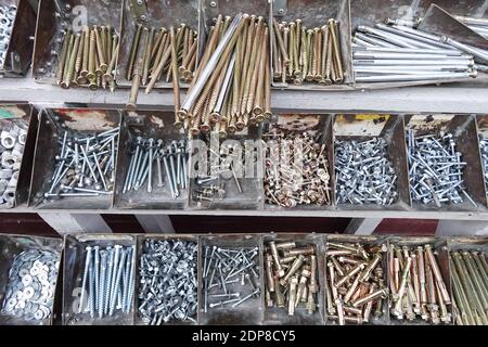 Bolts and screws in boxes Stock Photo