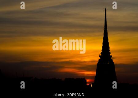 light Twilight after Sunset  with silhouette Temple pagoda - The beauty is light during twilight sky Stock Photo