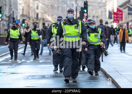 London, England. 19th December 2020. Anti lockdown protest held in Parliament Square. Photographer : Brian Duffy Stock Photo