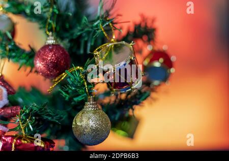 Decorated Christmas tree on blurred backgrounds Stock Photo