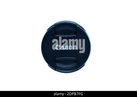 Canon camera lens cap close up view isolated on white background Stock Photo