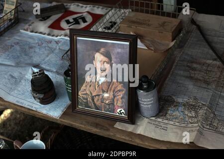 GREAT BRITAIN /England / Kent /Framed Adolf Hitler photo on desk at the  war and peace reenactment show. Stock Photo