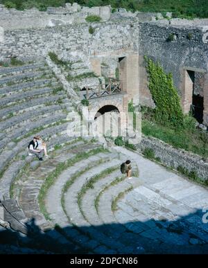 Archive scan of ruins of Pompeii comune destroyed by eruption of Mount Vesuvius in AD 79.  Odeon, smaller roofed theatre. May 1968. Stock Photo