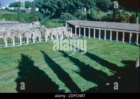Archive scan of ruins of Pompeii comune destroyed by eruption of Mount Vesuvius in AD 79.  Large Palaestra (Palestra), elevated view. May 1968. Stock Photo