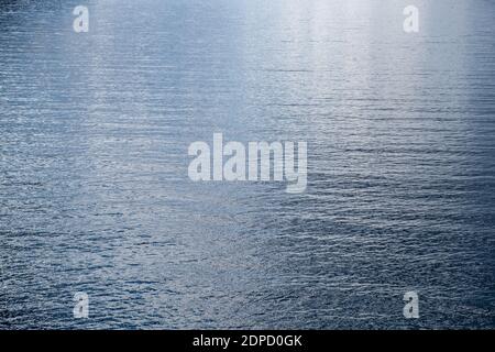 Sea water surface background. Calm blue water rippled with reflections. Mediterranean sea, summer vacation concept Stock Photo