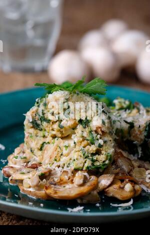 filled dumplings with mushroom sauce Stock Photo